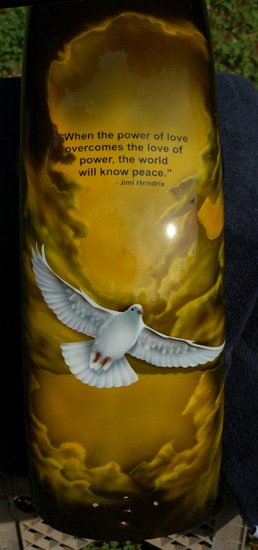 Quote from Jimi Hendrix & Dove of Peace airbrushed on custom painted Army green candy paint.