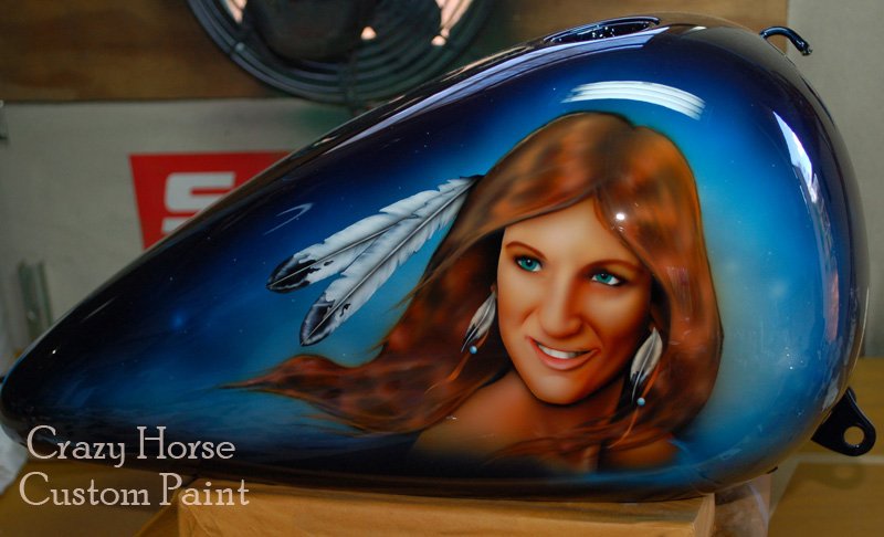 The owner of the bike is the subject of this tank.