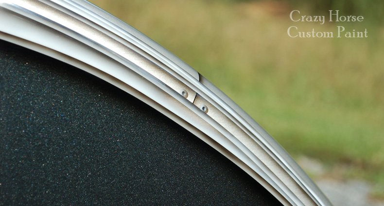  Closeup of Metal Graphic over Brushed Aluminum Effect with Panels and Rivets, over Gunmetal Grey Base.