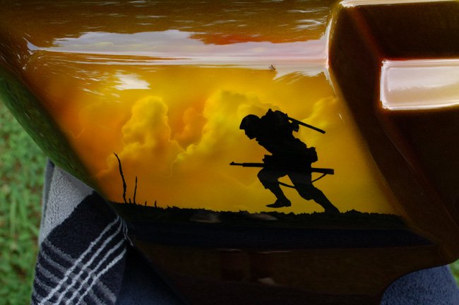 Scene from D Day airbrushed on custom painted Army green candy paint.