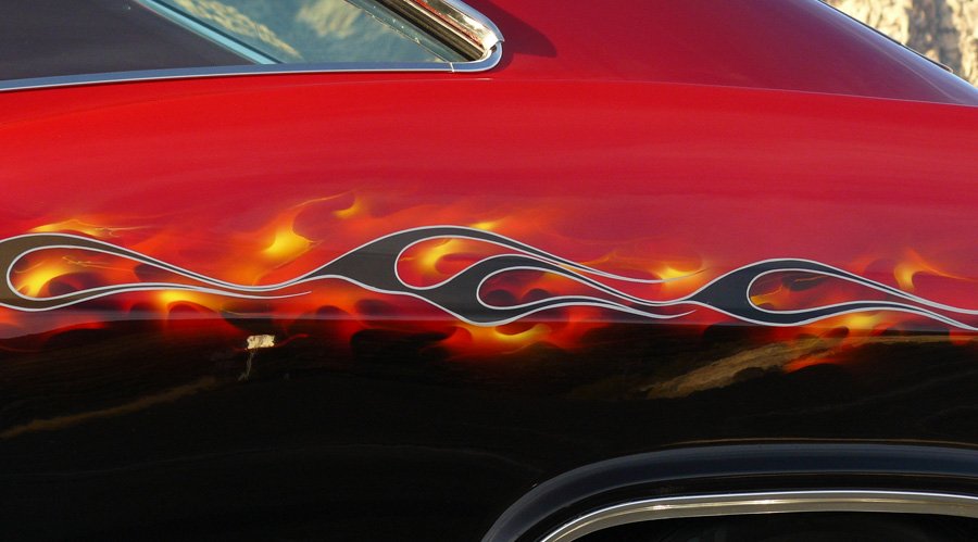 Traditional Flames fade from copper pearl to black. Real fire beneath.